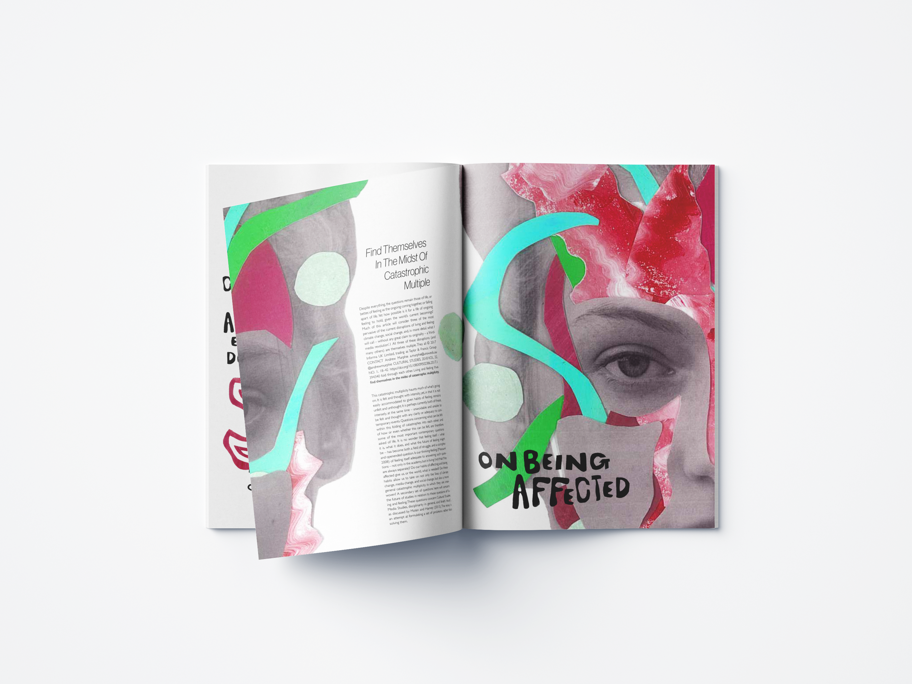 A vintage wooden desk with a mirror in the corner of a room with patterned wallpaper.