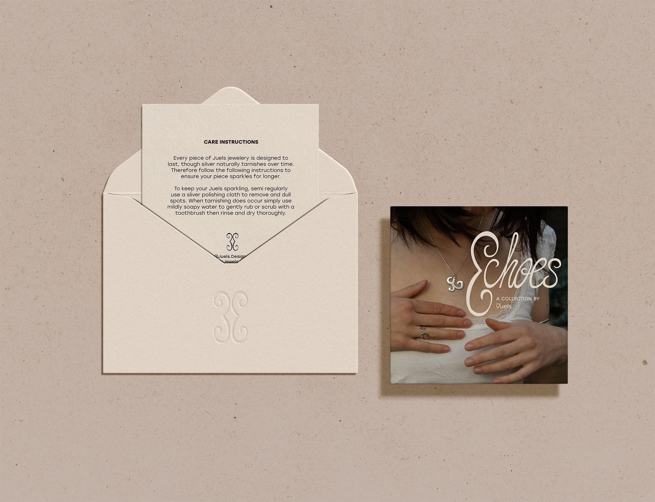 A vintage wooden desk with a mirror in the corner of a room with patterned wallpaper.